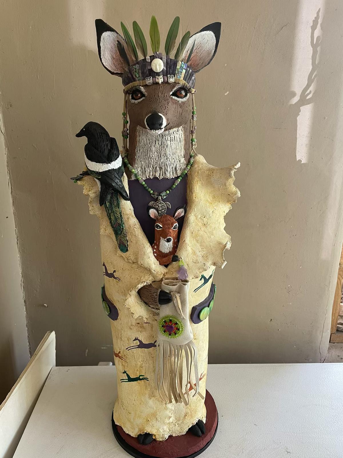 Deer with Black Bird